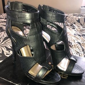 Black crocodile skin heels